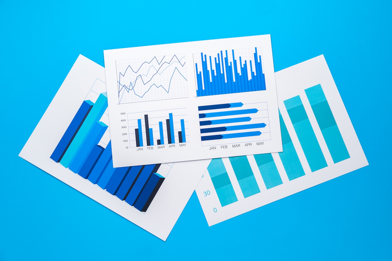 Office workplace table with report pages with financial data